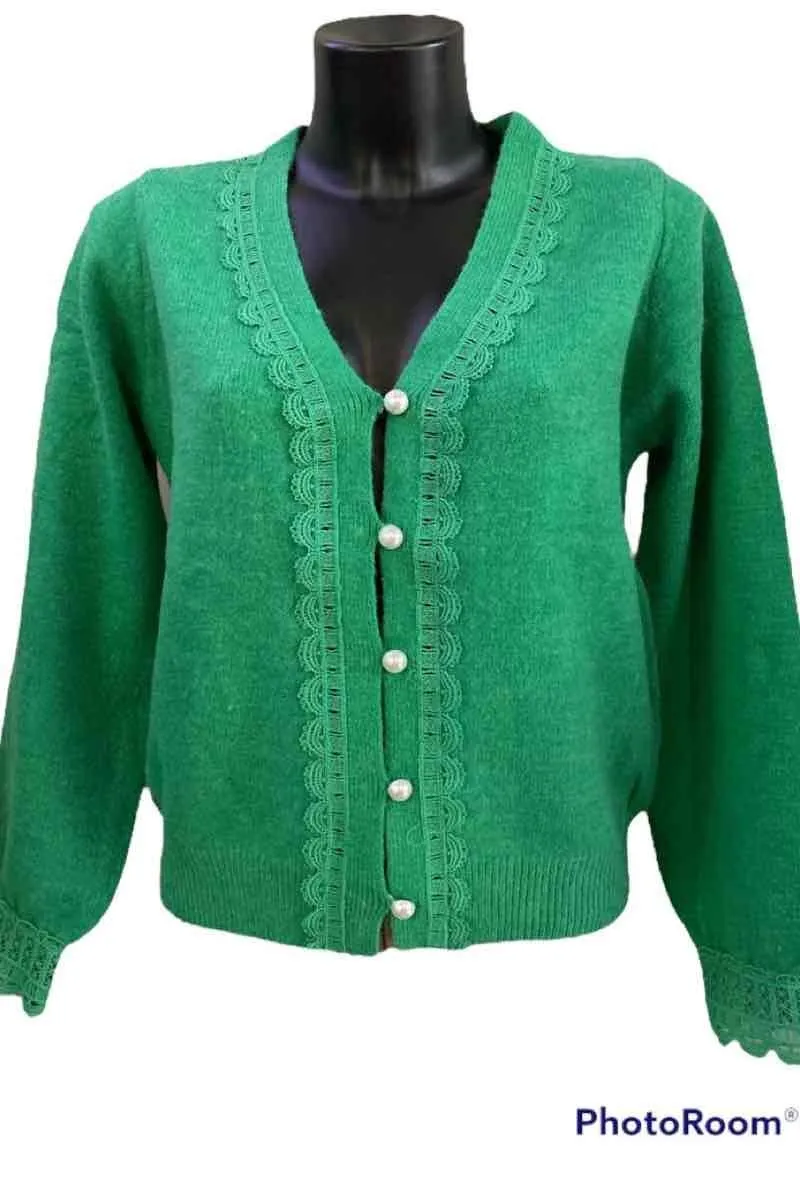 Short cardigan. lace at the cuffs and along the collar and front