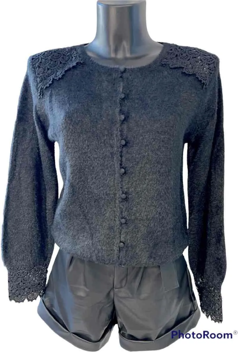 Very soft knit cardigan. lace details on the shoulders and handles